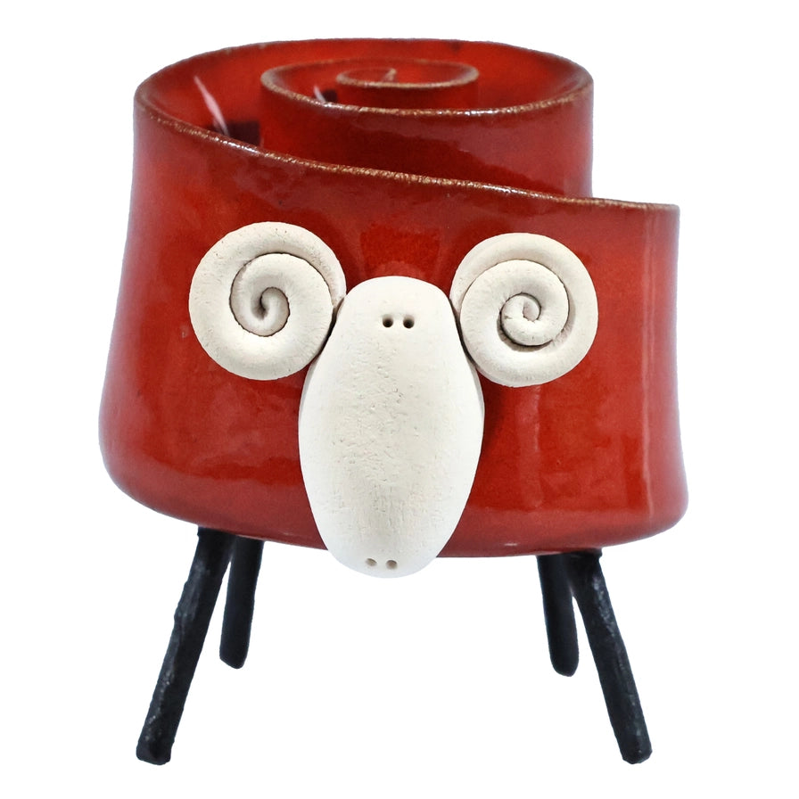 Red Ceramic Ram Sculpture With Spiral Horns And Black Iron Legs
