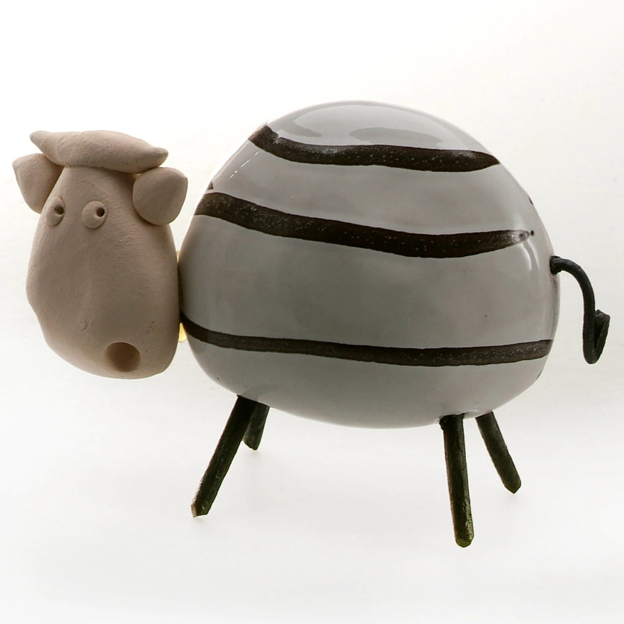 Handmade Ceramic Cow with Black Stripes and Black Legs