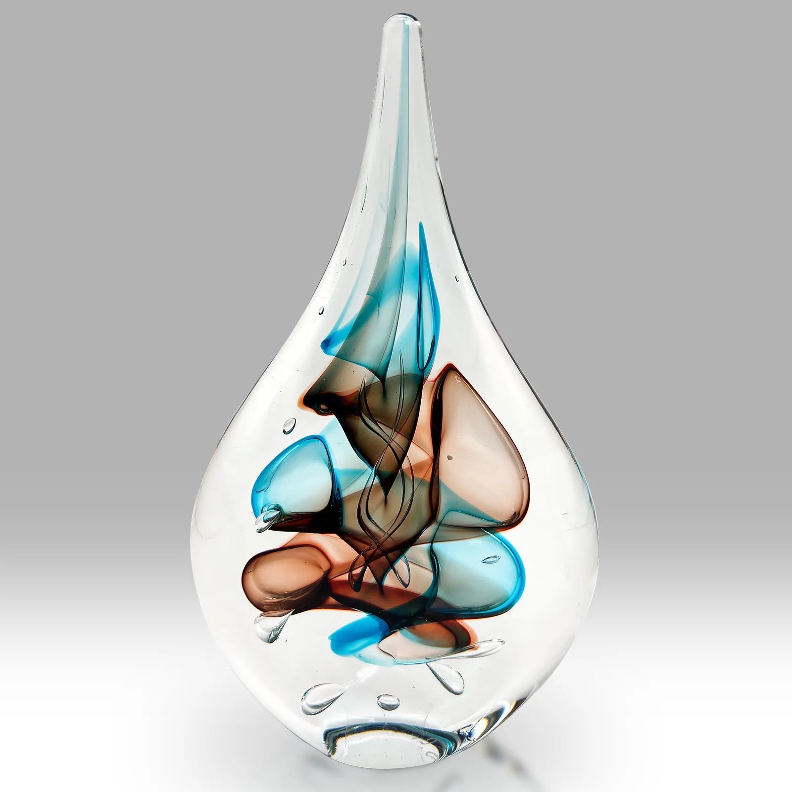 Handmade Fused Glass Paperweight with Blue and Brown Swirling Design