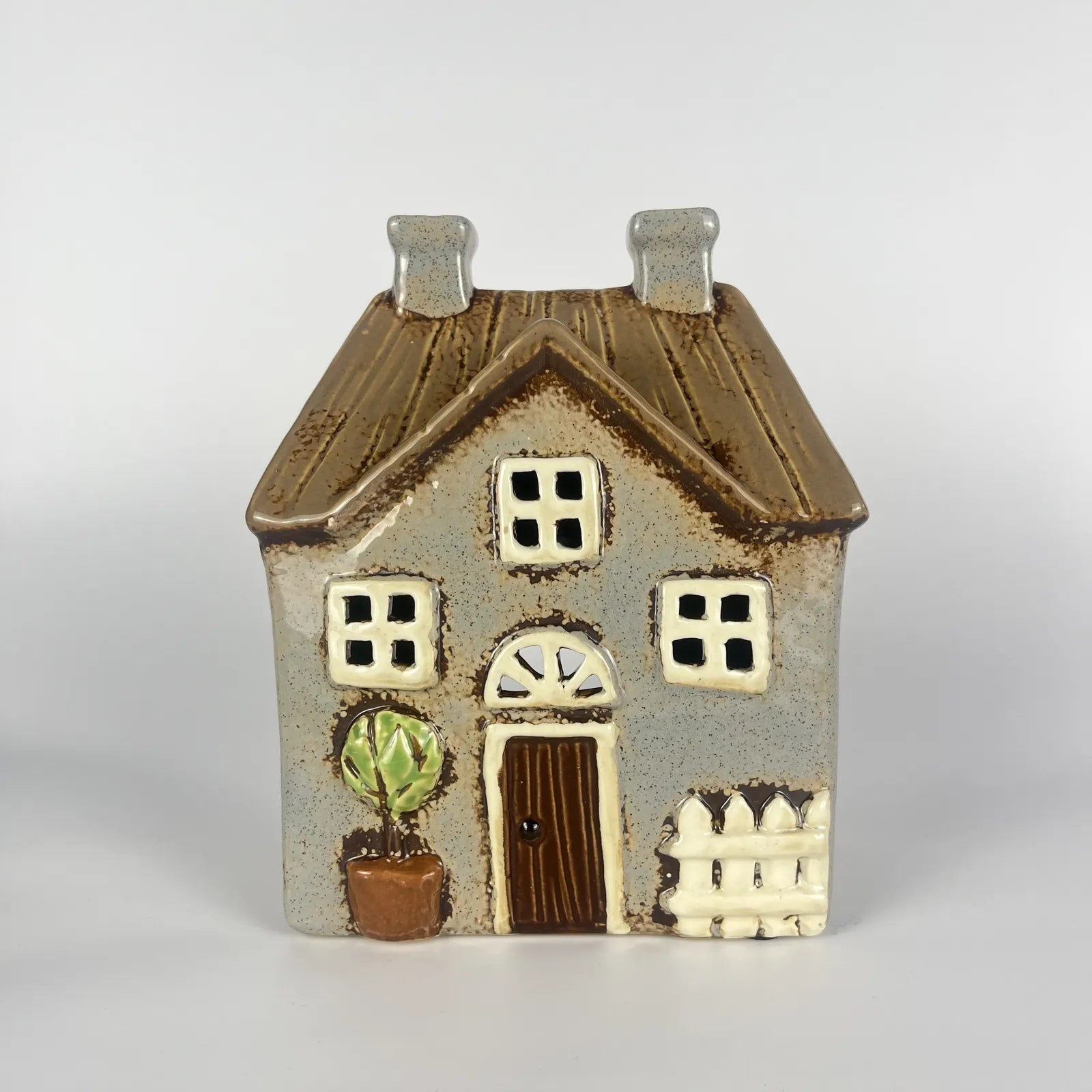 Brown Ceramic Tealight House with Green Plant and Fencing