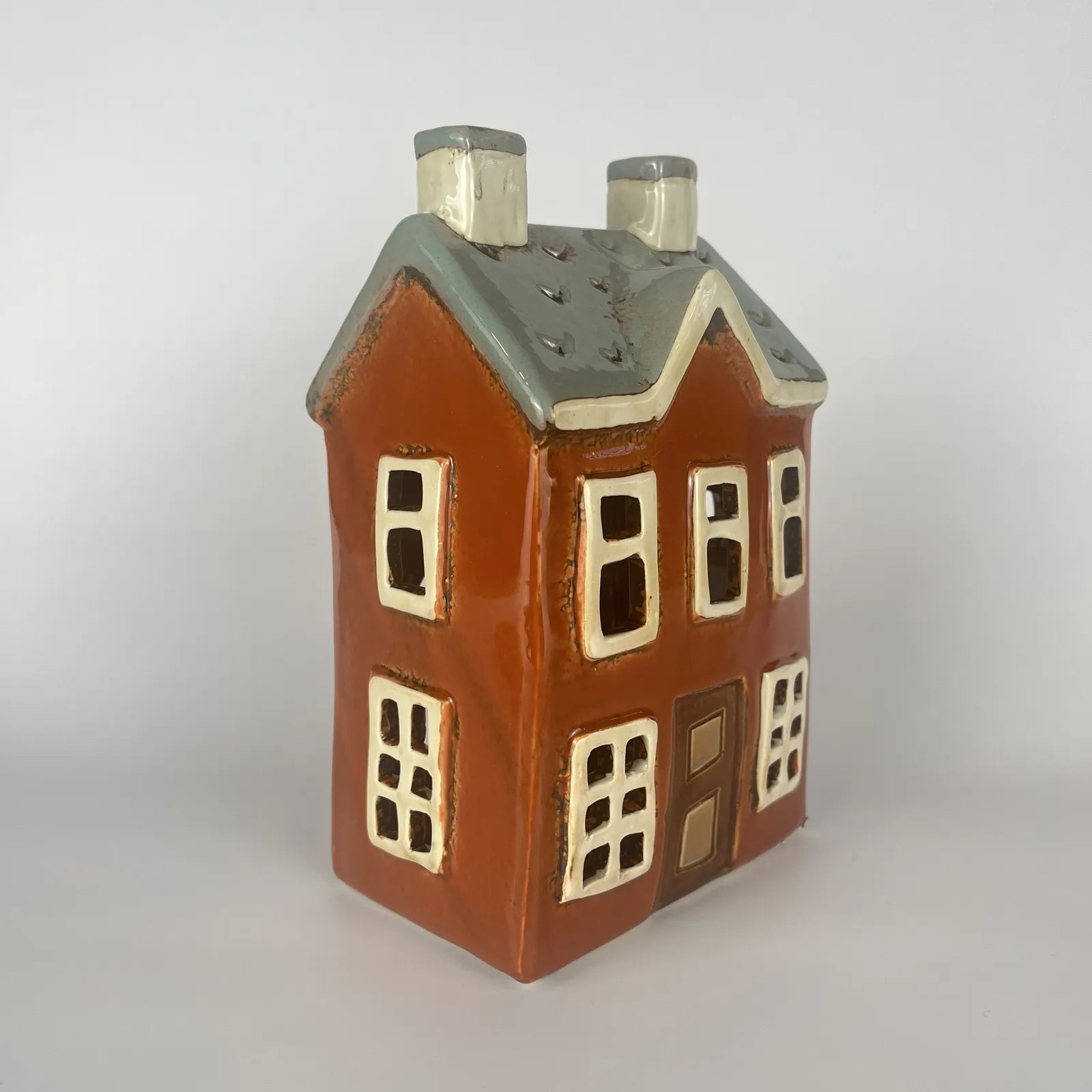 Orange Ceramic Tealight House with Green Roof and Brown Door