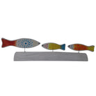 Trio Of Glass Fish On Wood