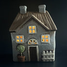 Brown Ceramic Tealight House with Green Plant and Fencing