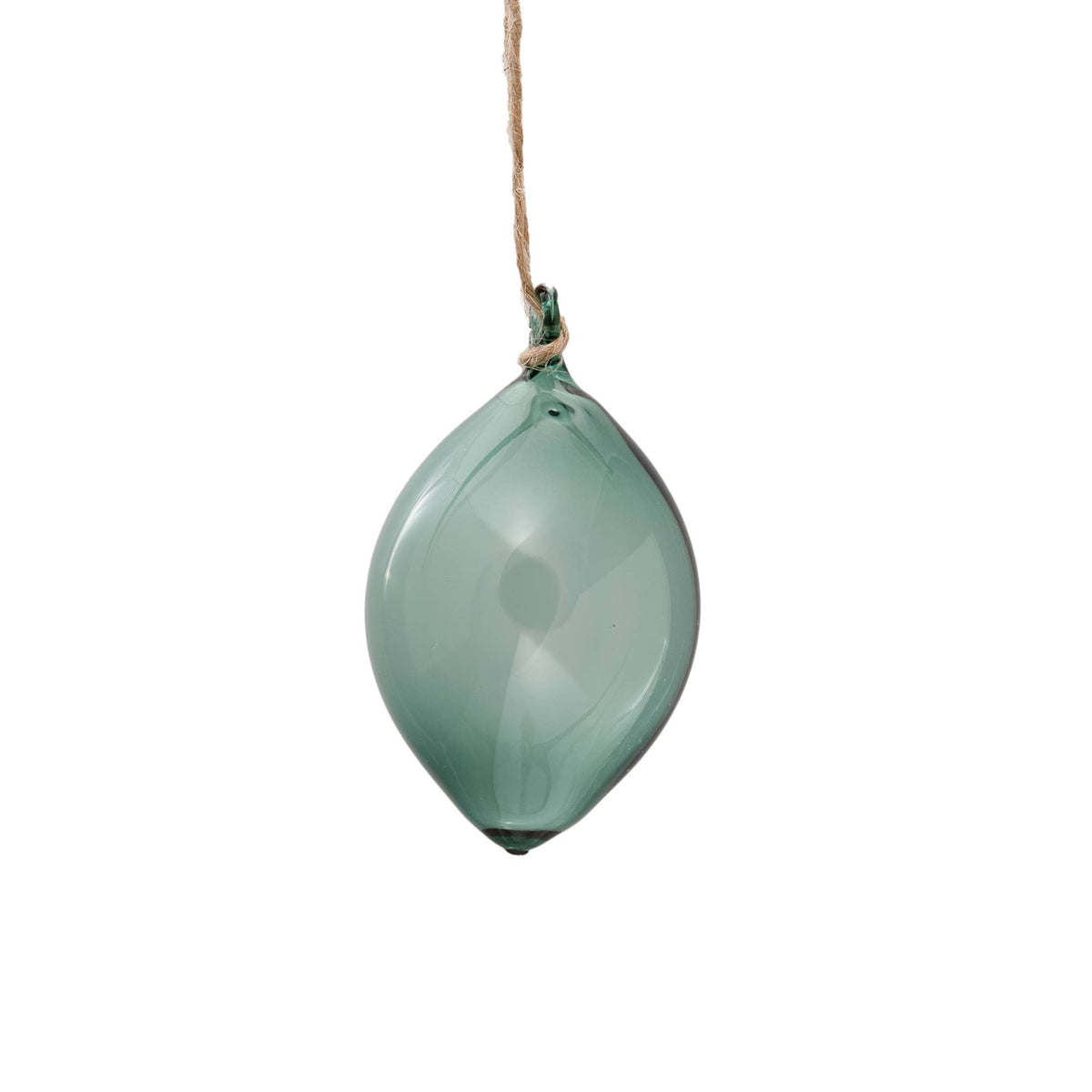 Teardrop-shaped green ornament hanging on a white background