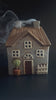 Brown Ceramic Tealight House with Green Plant and Fencing